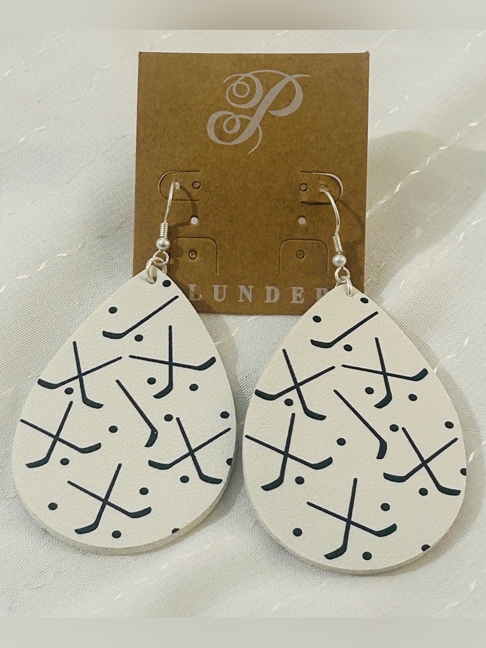 Plunder Design hockey-themed teardrop earrings.